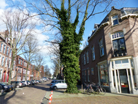 2023-35-414 Clemensstraat richting Wolphaertsbocht met rechts het centrum voor kinderopvang Kiddoozz. Gezien vanaf de ...