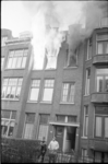 21217-5 Uitslaande brand op bovenétage in de Hugo Molenaarstraat.