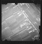 FD-4299-17 Verticale luchtfoto van de Zuidpolder en de polder Schieveen met de Doenkade (links), Rodenrijsche Kade ...
