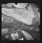 FD-4299-218 Verticale luchtfoto van Spijkenisse met de Welplaat en de Nieuwe Polder, de Oude Maas, de Noorddijk, de ...