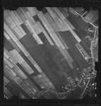 FD-4299-251 Verticale luchtfoto van Ridderkerk met de rijksweg Rotterdam-Dordrecht (heel klein stukje linksonder), de ...