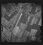FD-4299-289 Verticale luchtfoto van Ridderkerk met de Dordtschestraatweg, Lagedijk, Kerkweg, de dorpskern, de ...
