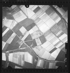 FD-4299-311 Verticale luchtfoto van Rhoon, met de Essendijk, de polder Het Buitenland, de Lageweg, de Poelweg, de hoeve ...