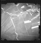 FD-4299-331 Verticale luchtfoto van Spijkenisse met de Westdijk, Zinkscheweg, Vereijleweg, Slikweg en Breeweg.