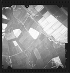 FD-4299-334 Verticale luchtfoto van Spijkenisse met de Breeweg, Hekelingsche Weg, Houwersche Weg, Meeldijk, Lange ...