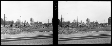 2008-14 Stereofoto. De restanten van gebouwen in de omgeving van de Delftsestraat, Stationsweg en Kruisweg na van het ...