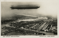 PBK-1987-1225 De Graf Zeppelin boven Nieuwe Maas en Noordereiland. Op de achtergrond de Koningshaven en de wijk Feijenoord.