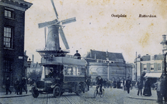 PBK-290 Molen De Noord aan het Oostplein.Tot 1912 stond daar het overblijfsel van de Oostpoort. Links ervan rijdt een ...
