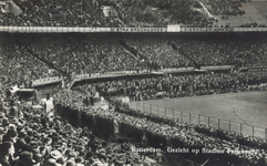 PBK-6553 En vol gepakt Feijenoord Stadion tijdens een voetbalwedstrijd, vermoedelijk de interland Nederland-Belgie.