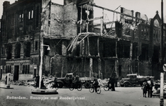 PBK-932 Puinresten na het bombardement van 14 mei 1940. De Boompjes hoek Rederijstraat met de bijbank van de ...