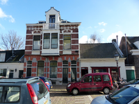 2023-35-320 Negentiende-eeuwse woningen en midden herenhuis aan de Grondherendijk in Oud-Charlois.
