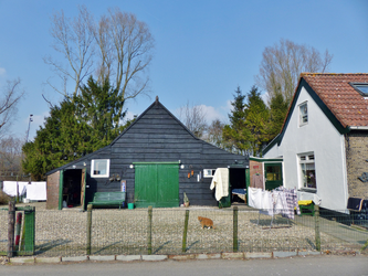 2023-35-466 Woonhuis met schuur, huisnummer 577 aan de Charloisse Lagedijk, het gedeelte onder de wijk Zuidwijk.