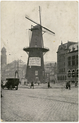 PBK-10569 Coolsingel met molen de Hoop. Op de achtergrond de bouw van het stadhuis.
