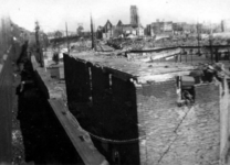 1979-1134 Gezicht op de door het Duitse bombardement van 14 mei 1940 getroffen. Gedempte Binnenrotte, met de Sint ...