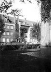 1979-1525 Gezicht in de Huygensstraat met verwoest huis als gevolg van een Engels bombardement op vijf oktober 1940.
