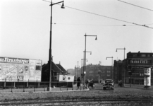 1989-2700 Reclamebord nabij de politiepost op het Marconiplein. Op de achtergrond de Mathenesserdijk.
