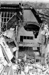 2001-1732 Puinresten na het bombardement van 14 mei 1940. De Botersloot met het telefoongebouw.
