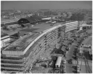 191 Centraal Station in aanbouw, gefotografeerd vanuit het Groot Handelsgebouw.