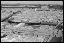 1980-5157 Een blik op de binnenstad ongeveer een jaar na het bombardement van 14 mei 1940. Het puin is grotendeels ...