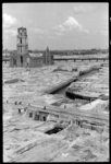 1980-5159 Een blik op de binnenstad ongeveer een jaar na het bombardement van 14 mei 1940. Het puin is grotendeels ...