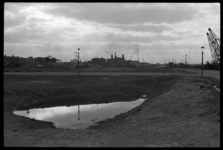1980-5769 De westkant van het Noordereiland waar de bebouwing gesloopt is na de beschadigingen als gevolg van de ...