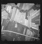 FD-4299-205 Verticale luchtfoto van de Oud-Pernissepolder, de Heyschedijk, de Hofdijk, de oliespoorlijn en de Karvelschedijk