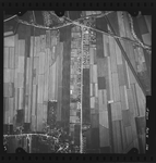 FD-4299-280 Verticale luchtfoto van Barendrecht met de Oostweg [Barendrechtseweg], de dorpskern, de Pieterseliedijk, de ...