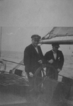 1984-186 Directeur T. Westerhof (links) van de Hogere zeevaartschool aan het roer van een zeilschip, mogelijk de ...