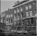 34586 Woningen en bedrijfspanden aan de Rembrandtstraat en hoek van het Noordplein.