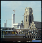 99104 Zicht op de Laurenskerk vanaf een gebouw aan de Kolk of Binnenrotte. Op de voorgrond Station Blaak en de ...
