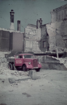 1988-1252 Een vrachtauto van Poot & Baade geladen met puin na het bombardement van mei 1940.