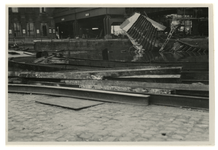 XXXIII-569-37-27 Schade aan het Beursstation aan de Kolk als gevolg van het Duitse bombardement van 14 mei 1940.